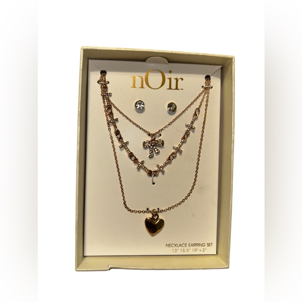 nOir Necklaces and Eating Set. NIB